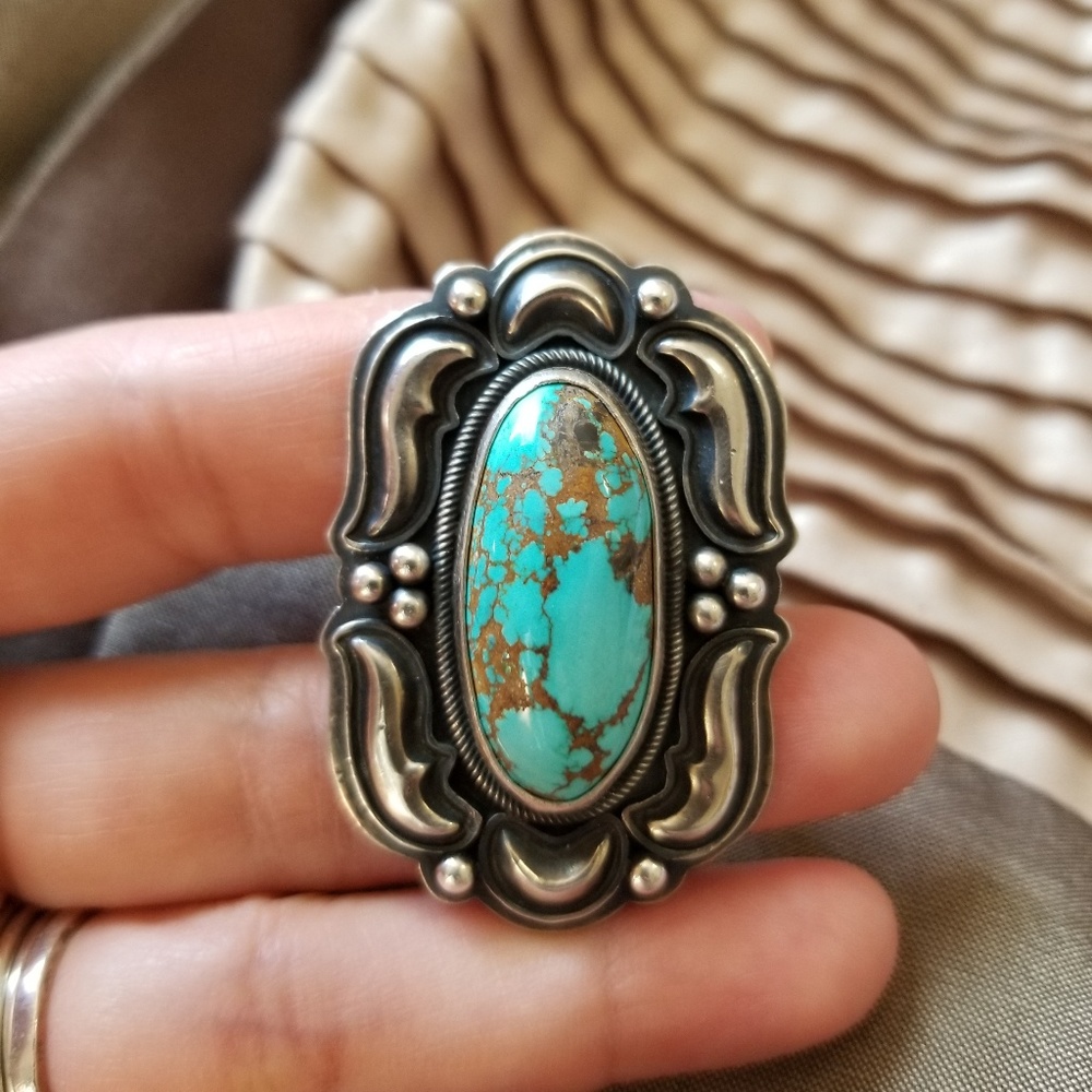 Sterling # 8 turquoise ring. Signed R. Bennett.